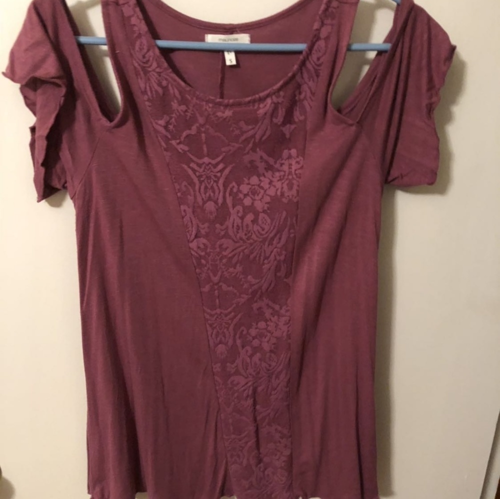 Maurices shirt.
